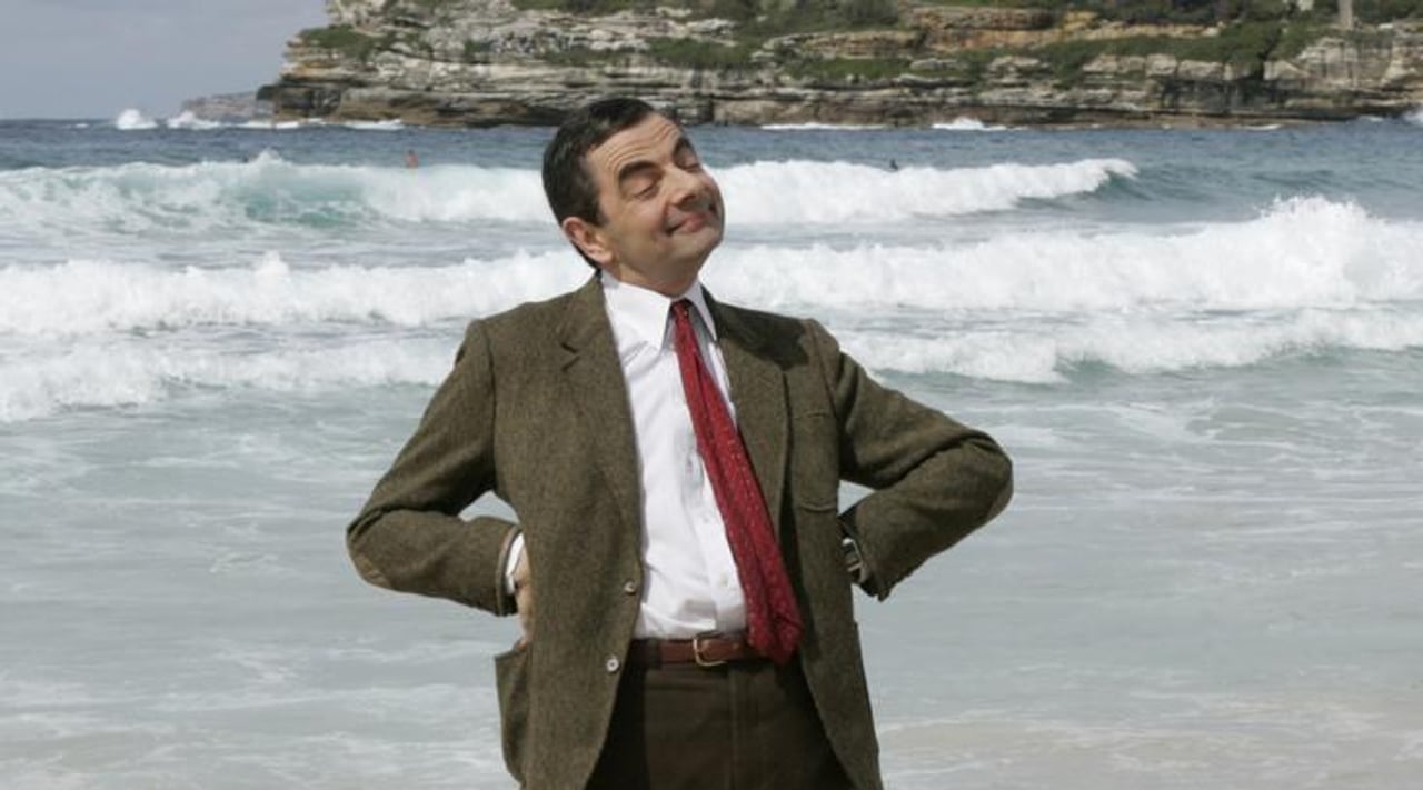 Rowan Atkinson je srečo našel ob 26 let mlajši Louise Ford